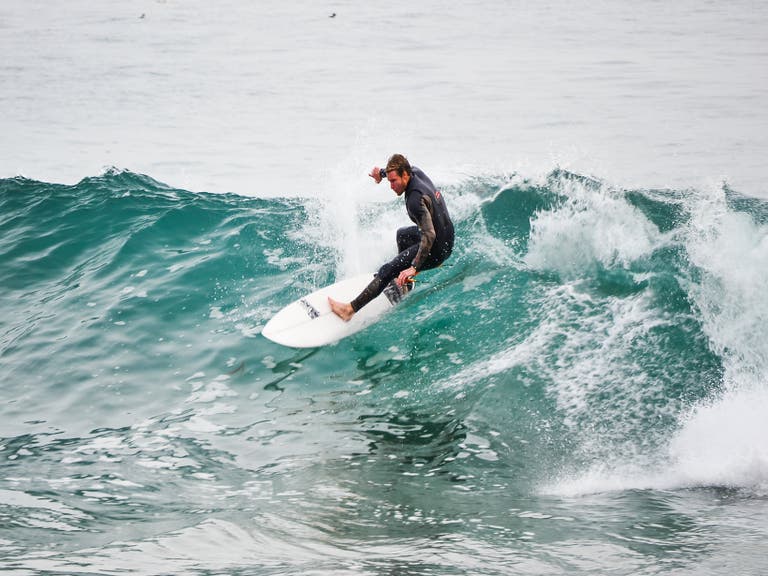 Surfer at Zuma Beach